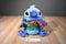 Disney Store Holiday Stitch Plush Wearing a Green Jacket/ Red Scarf