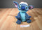 Disney Store Blue Stitch Plush Wearing a Red Stocking Hat